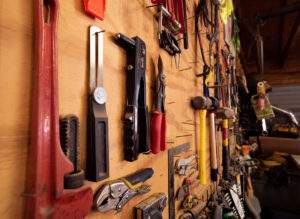 tools hanging on a tool wall