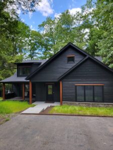 black home with chestnut brown accents
