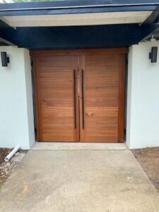 exterior of home with wood sliding doors